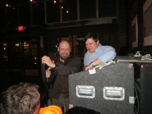 Pub owner Ryan Ballinger helps me with the sound system.