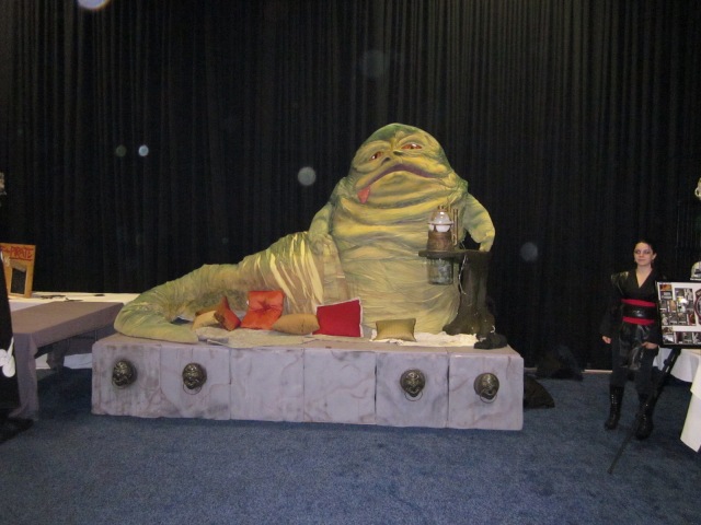 This Jabba the Hut was both a costume and photo-opp scenery. The body was covered with a fabric that reminded me of sleeping bag material, but the heads comes off, allowing someone to climb in and move the arms.